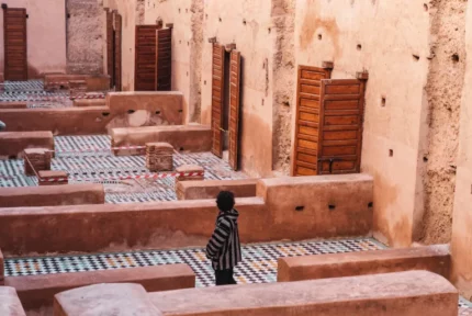 Sunken courtyards, cedar doors and zellige floors of a ruined palace in the Marrakech medina